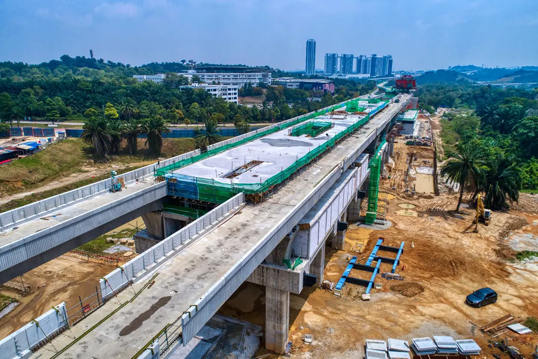 Aerial view of the Cyberjaya City Centre MRT Station showing the completed concourse and intermediate level while platform for post tensioning beam in progress.